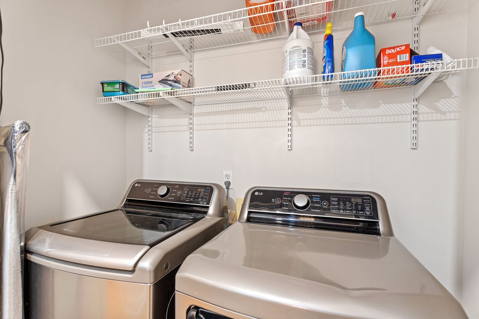 In-unit washer and dryer with shelving